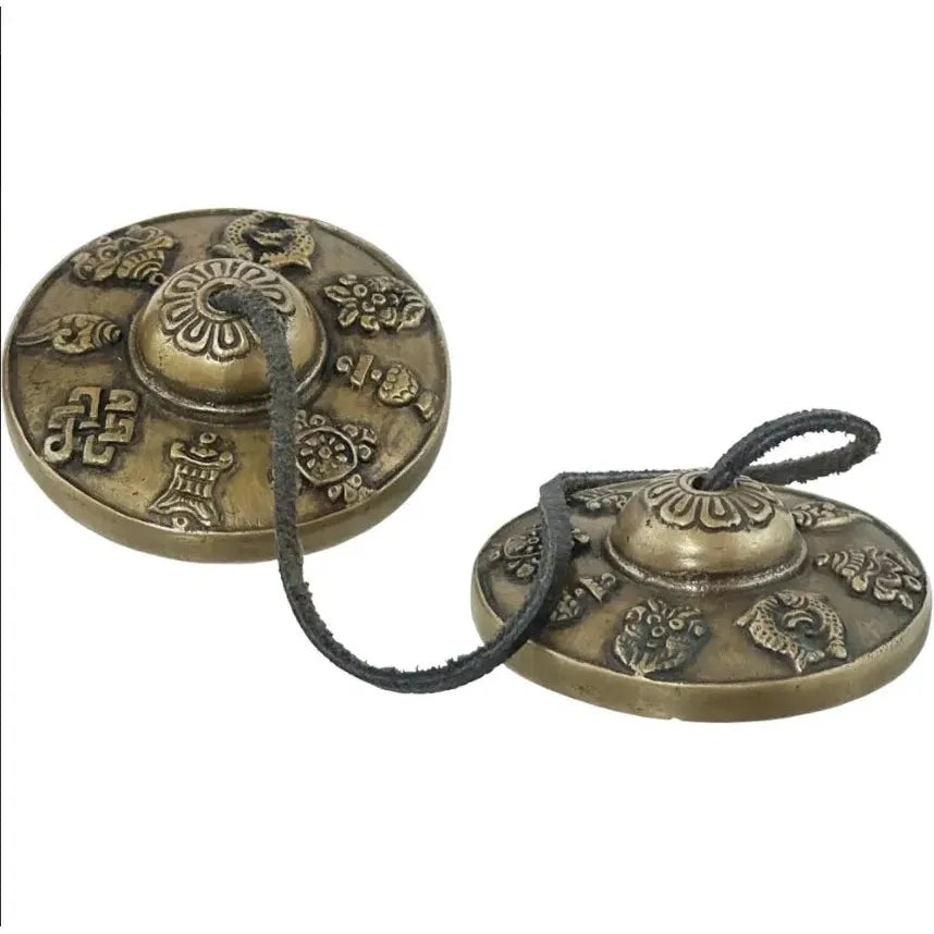 Tingshas tibetanos con ocho símbolos auspiciosos